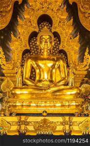 Ancient golden Seated Buddha Statue (with the name at the base) in Wat Phra That Doi Phra Chan on the top of mountain in Mae Tha District Lampang Thailand