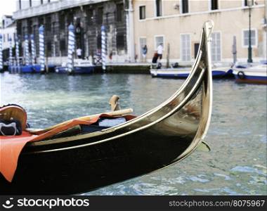 Ancient gondolas in Venice. Close up black gondola
