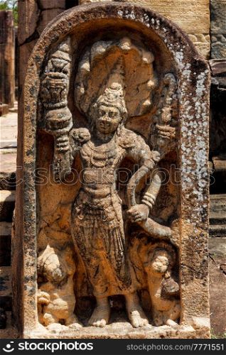 Ancient guardstone bas relief at Vatadage in Pollonnaruwa, Sri Lanka. Ancient guardstone relief