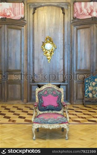 Ancient interior chair. Hermitage. St. Petersburg. Russia.