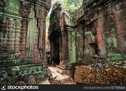 Ancient Khmer architecture. Ta Prohm temple with giant banyan tree at Angkor Wat complex, Siem Reap, Cambodia. Two images panorama