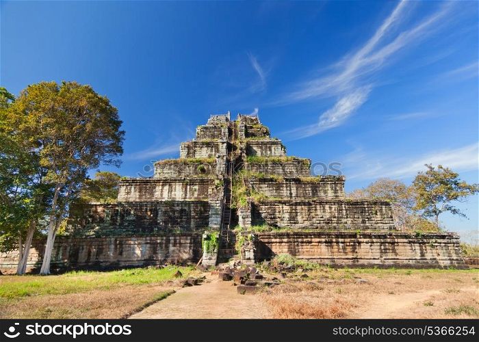 Ancient khmer pyramid in Koh Kher, Cambodia with blue sky and clouds, sunny day&#xA;