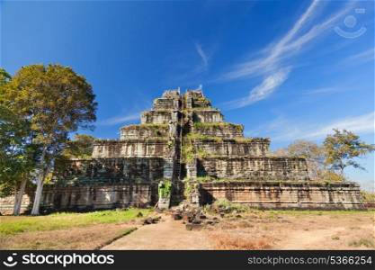 Ancient khmer pyramid in Koh Kher, Cambodia with blue sky and clouds, sunny day&#xA;