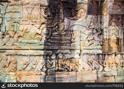 Ancient khmer stone carving in Angkor Thom in Cambodia. May be used as background
