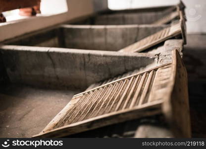 Ancient laundry room in cordoba, spain with wooden washboards