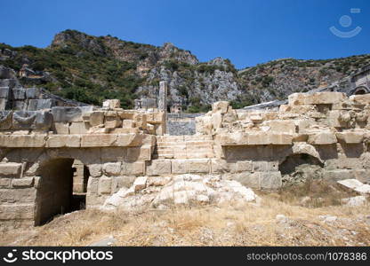 Ancient lycian necropolis with tomb carved in rocks in Mira