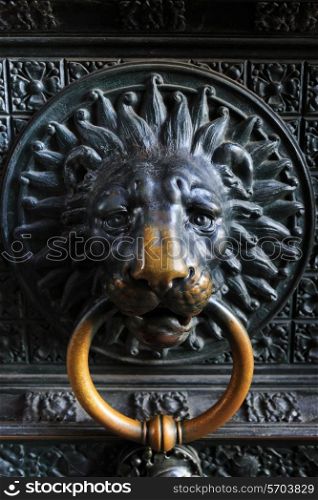 Ancient metal lion head on the door to catholic church in Cologne, Germany&#xA;