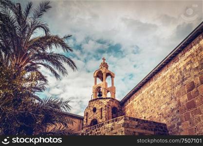 Ancient monastery, view on a great old orthodox church over sky background, vintage bell tower, Middle East, Lebanon