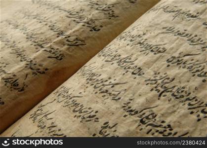 ancient open book in arabic. old arabic manuscripts. ancient arabic book