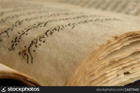 ancient open book in arabic. old arabic manuscripts. ancient arabic book