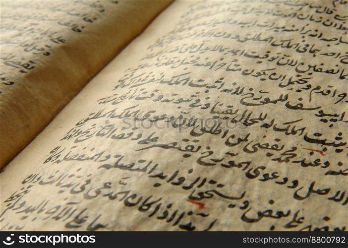 Ancient open book in arabic. Old arabic manuscripts and texts. ancient arabic book