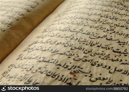 Ancient open book in arabic. Old arabic manuscripts and texts. ancient arabic book