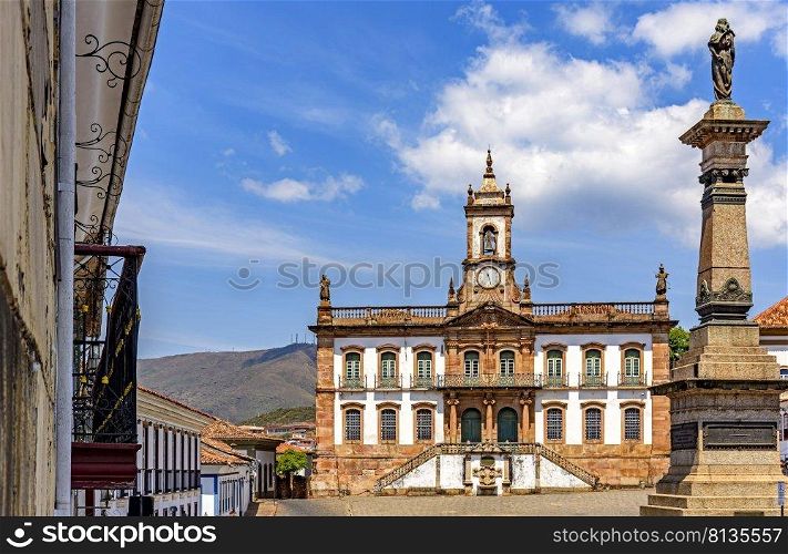 Ancient Ouro Preto central square with its historic buildings and monuments in 18th century Baroque and colonial architecture. Ouro Preto central square with its historic buildings and monuments