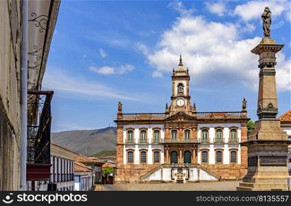 Ancient Ouro Preto central square with its historic buildings and monuments in 18th century Baroque and colonial architecture. Ouro Preto central square with its historic buildings and monuments