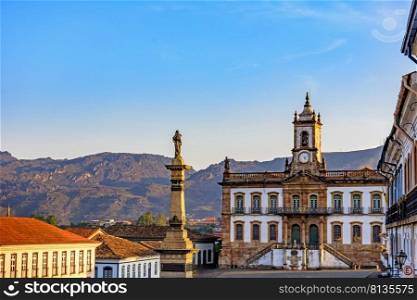 Ancient Ouro Preto central square with its historic buildings and monuments in 18th century Baroque and colonial architecture. Ancient Ouro Preto central square with its historic buildings and monuments