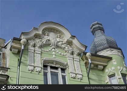 Ancient renovated building with rich decoration in Ruse - beauty town with varied style West-European architecture, Bulgaria, Europe