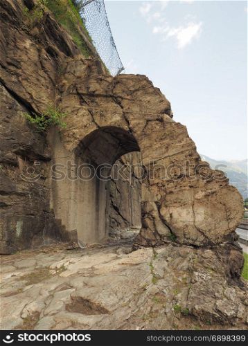 Ancient roman road arch in Donnas. Ancient roman consular road stone arch in Donnas, Italy