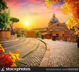 Ancient Roman stone street in Rome, Italy. Ancient stone street