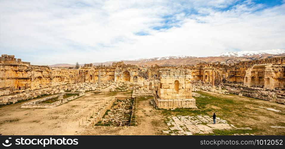 Ancient ruined walls and columns of Grand Court of Jupiter temple, Beqaa Valley, Baalbeck, Lebanon