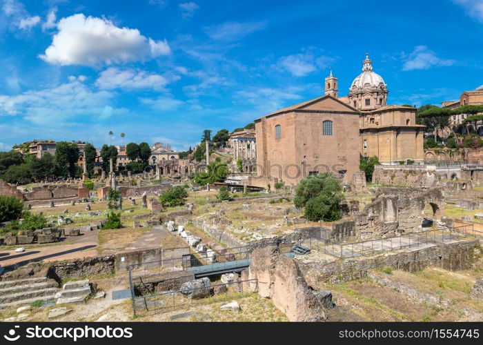 Ancient ruins of Forum in a summer day in Rome, Italy