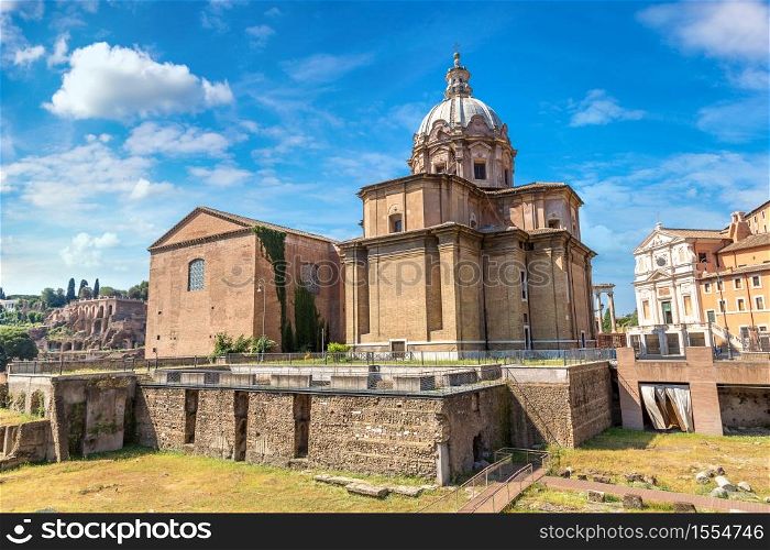Ancient ruins of Forum in a summer day in Rome, Italy