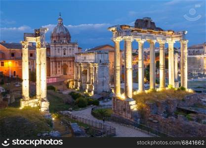 Ancient ruins of Roman Forum at night, Rome, Italy. Ancient ruins of a Roman Forum or Foro Romano during evening blue hour in Rome, Italy