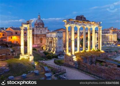 Ancient ruins of Roman Forum at night, Rome, Italy. Ancient ruins of a Roman Forum or Foro Romano during evening blue hour in Rome, Italy. View from Capitoline Hill