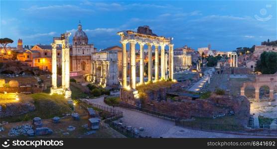 Ancient ruins of Roman Forum at night, Rome, Italy. Ancient ruins of a Roman Forum or Foro Romano during evening blue hour in Rome, Italy. Panoramic view from Capitoline Hill
