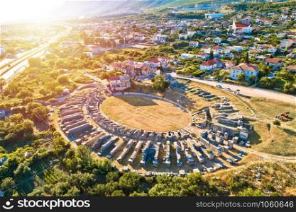 Ancient Salona or Solin amphitheater aerial sunset view, Split region of Dalmatia, Croatia