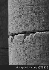 Ancient scripture on pillar at Ephesus in Kusadasi Turkey