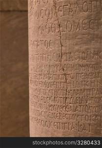 Ancient scripture on pillar at Ephesus in Kusadasi Turkey