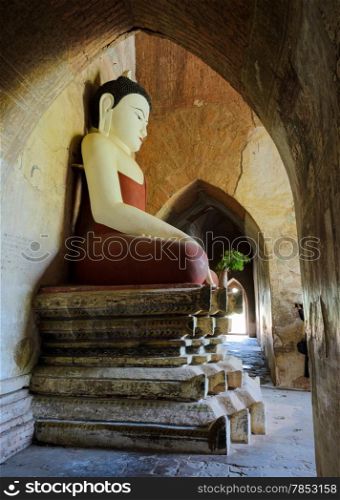 Ancient seated buddha statue in Bagan, Myanmar