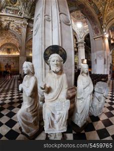 Ancient statues inside the roman catholic cathedral dedicated to Saint Alexander of Bergamo, Italy&#xA;