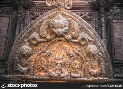 ancient statues of Nepal carved from stone and wood. statues of Nepal