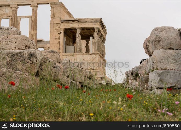 Ancient statues of the Caryatids on the Erechtheion or Erechtheum temple in Acropolis. Porch of the Caryatids on Erechtheion or Erechtheum in Athens