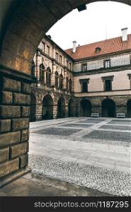 Ancient stone castle courtyard, nobody, Europe museum. Medieval european architecture. Ancient stone castle courtyard, nobody, Europe