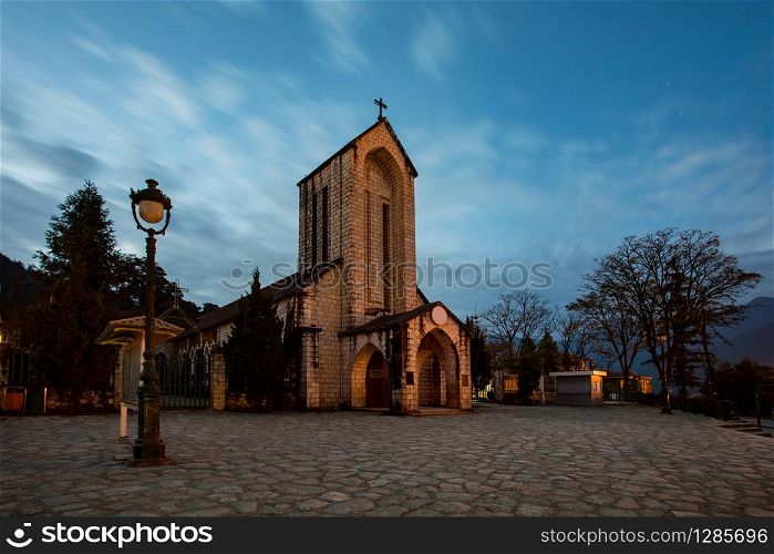 ancient stone church of sapa with blue night sky most popular traveling destination in sapa norhtern of vietnam
