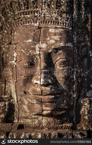 Ancient stone face of Bayon temple, Angkor, Cambodia