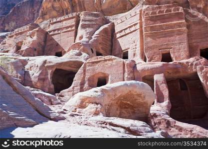 ancient stone houses on Facade Street in Petra, Jordan