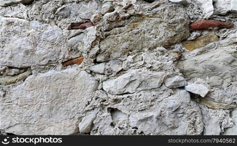 Ancient stone wall background closeup