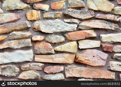 Ancient stone wall to use as background.. Ancient stone wall to use as background or texture.