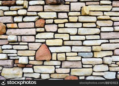 Ancient stone wall to use as background.. Ancient stone wall to use as background or texture.