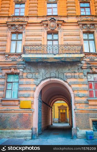 Ancient streets and houses in the city of St. Petersburg in Russia. Ancient streets and embankment with the Neva River in the city of Saint Petersburg