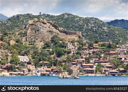 Ancient turkish castle on the hill near shore