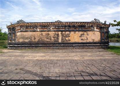 Ancient wall on the ground of royal tomb near Hue, Vietnam