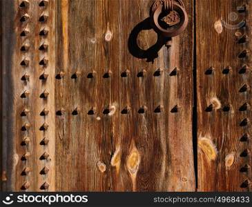 Ancient wooden door in Valencia Torres de Serranos at Spain