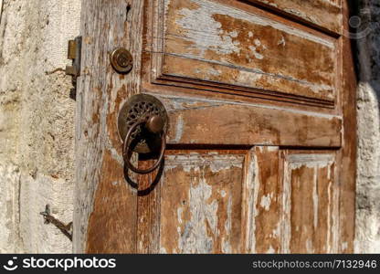 ancient wooden door of one of the ancient mosques of Istanbul