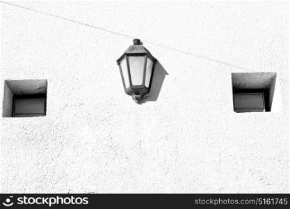 and abstract background in oman old streetlamp in the wall