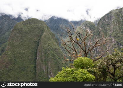 Andes cloudy mountains view from Machu Picchu