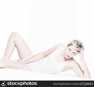 androgynous sexy woman. androgynous sexy woman in bed on white background